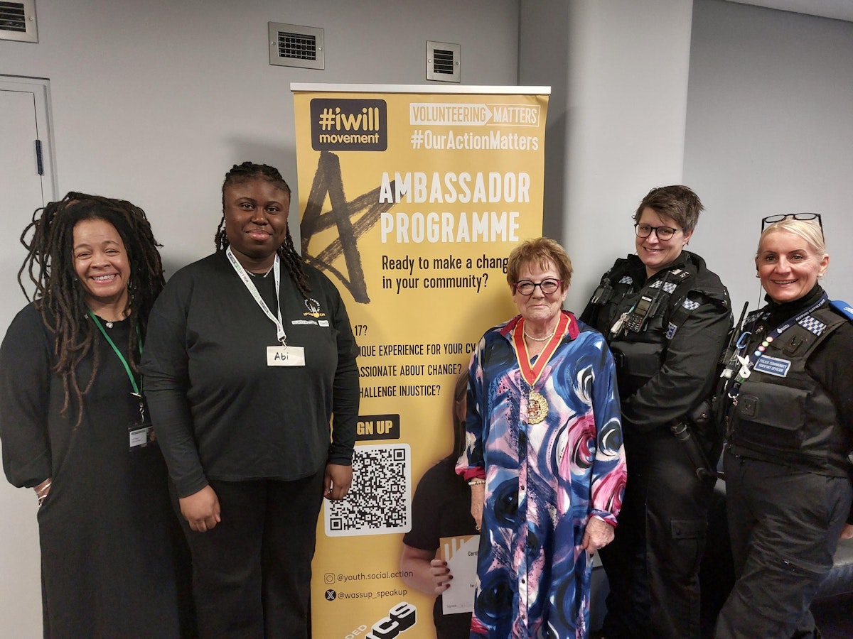 Liz Harsant with community leaders and police officers